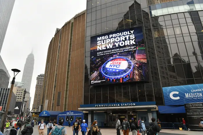 Madison Square Garden's exterior shows a billboard that says "MSG support MSG" noting that it is an early voting site